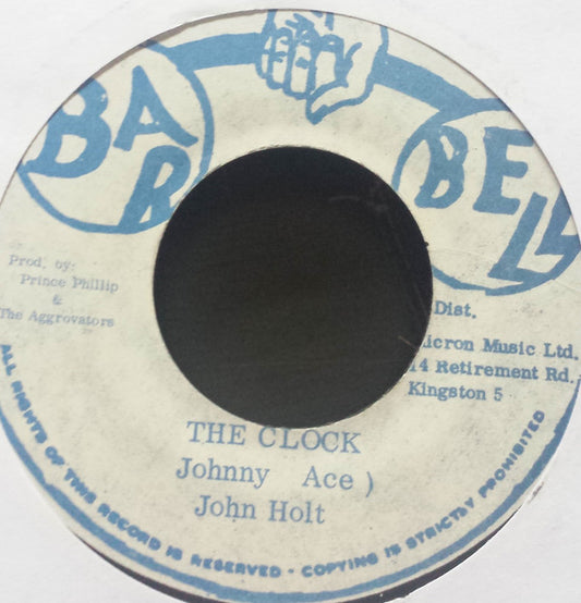 John Holt / Philip Smart & The Aggrovators : The Clock / Death Trap (7")