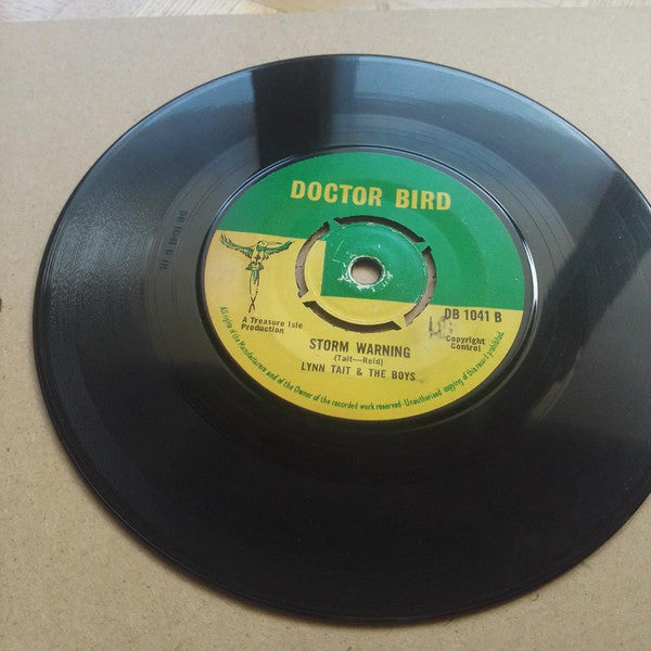 The Silvertones With Lynn Taitt & The Boys / Lynn Taitt & The Boys : It's Real / Storm Warning (7", Single)