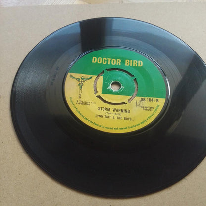 The Silvertones With Lynn Taitt & The Boys / Lynn Taitt & The Boys : It's Real / Storm Warning (7", Single)